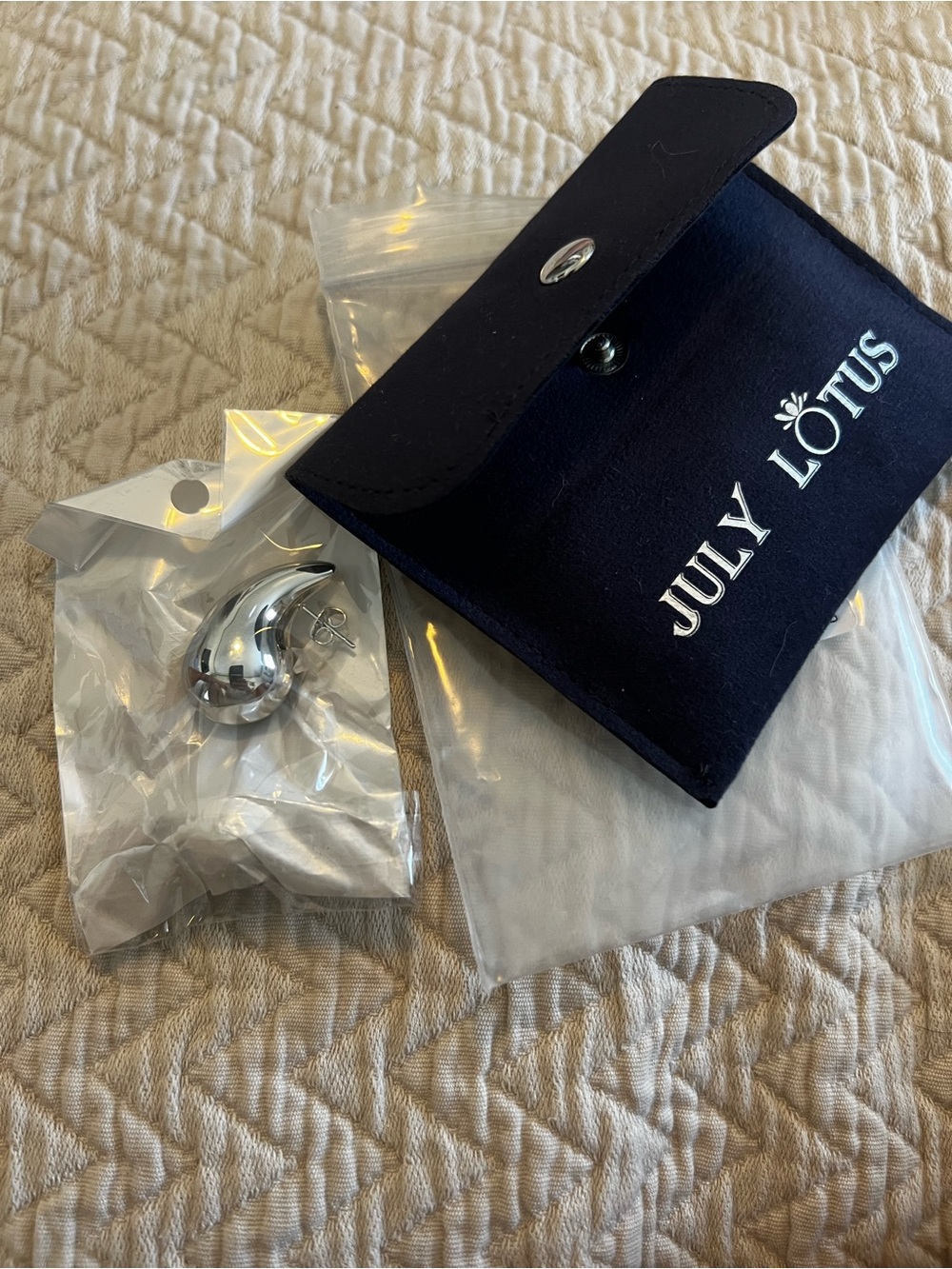 July Lotus Silver Teardrop Earrings with Branded Pouch